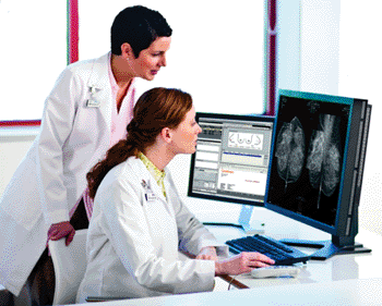 Image: Physicians viewing the DBT Mammography Module (Photo courtesy of Carestream Health).